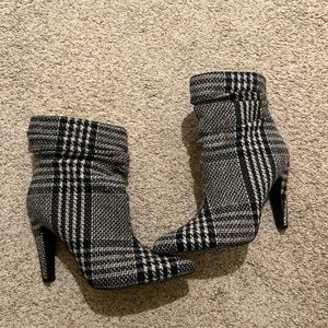 Black and gray sweater boots with heel
